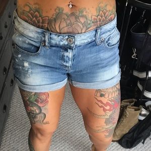 EXPRESS light wash distressed denim shorts